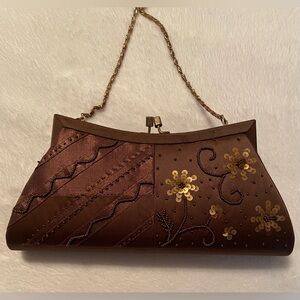 Elegant Brown and Gold Clutch with Floral Accents